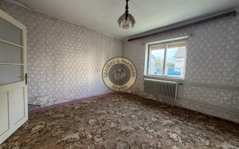 Na predaj rodinný dom v pôvodnom stave v obci Malženice