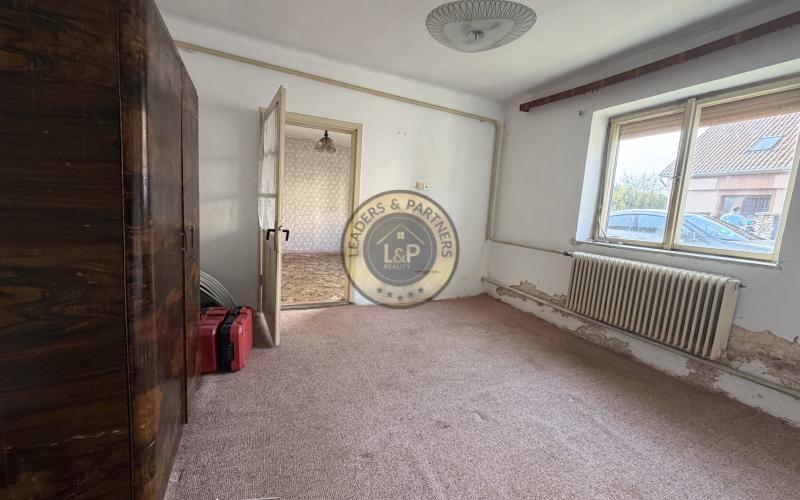 Na predaj rodinný dom v pôvodnom stave v obci Malženice